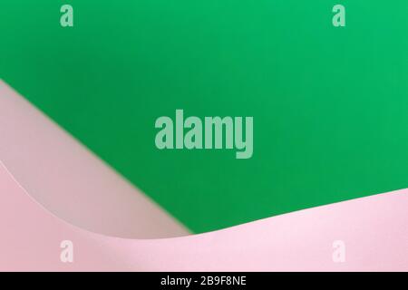 Abstract geometric shape pink and green color paper background Stock Photo