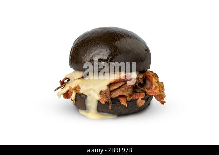 Modern black burger with fried bacon and white sauce Stock Photo