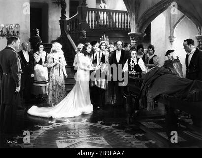 VALERIE HOBSON as Elizabeth Frankenstein and UNA O'CONNOR as Minnie with House Servants in THE BRIDE OF FRANKENSTEIN 1935 director JAMES WHALE art direction Charles D. Hall Universal Pictures Stock Photo