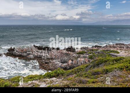 costal hiking trail in nature reserve rocky beach ocean South Africa Stock Photo