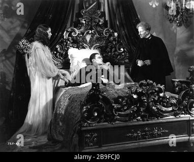 VALERIE HOBSON as Elizabeth Frankenstein COLIN CLIVE as Henry Frankenstein and ERNEST THESIGER as Doctor Pretorius in THE BRIDE OF FRANKENSTEIN 1935 director JAMES WHALE Universal Pictures Stock Photo