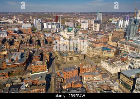 Aerial photo of the town centre of Leeds in West Yorkshire, taken on a beautiful sunny day showing the Leeds Town Hall