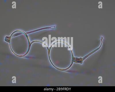 Glasses with round lenses on strength, frame of brass with wide bridge and hinged springs that end in loop shape, spectacle eye lens equipment glass copper base metal, glass, Glasses with round lenses on strength. The frame and the bridge is one piece and of brass The bridge is thin but wide. The flat narrow straight springs are fixed to the frame. The spring ends in small loop shape seeing eyesight-farsighted eye drift correction Stock Photo