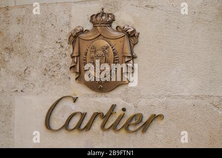 Bordeaux , Aquitaine / France - 10 10 2019 : Cartier signage with coat of arms of the Cartier family on wall store designs and sells jewellery and wat Stock Photo