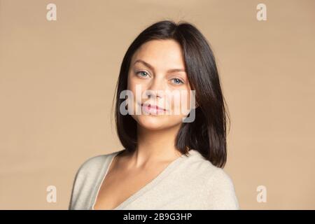 Portrait confident beautiful brunette woman Stock Photo