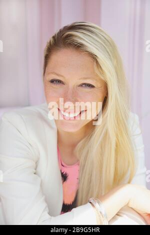 Portrait confident young blonde woman Stock Photo