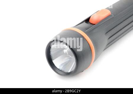 Flashlight in black on an isolated white background Stock Photo