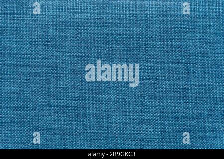 Bright blue mottled denim look fabric rough textile fabric Stock Photo