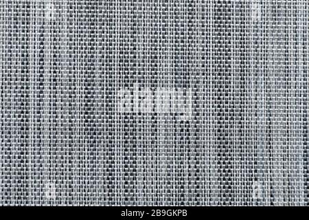 Grey mottled fabric woven by synthetic fabric lace mat textured Stock Photo