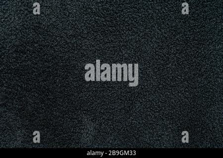 Texture of wool face towel in black soft and fluffy Stock Photo
