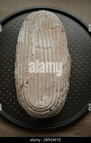 Raw rye dough bread from above on sheet Stock Photo - Alamy