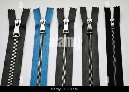 Metal zipper set for sewing clothing and bags Stock Photo