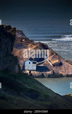 Deserted boathouse at Worm's Head, Gower Peninsula, Wales, UK Stock Photo