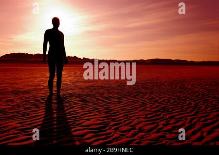 Another Place is a piece of modern sculpture by Sir Antony Gormley located at Crosby Beach in Merseyside, England.UK Stock Photo