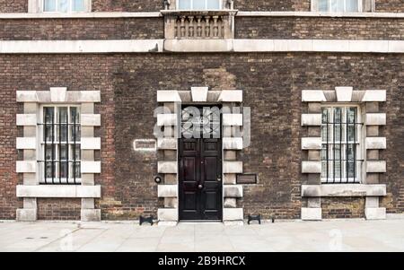 London town house. The façade to a generic Georgian urban townhouse in the heart of Westminster. Stock Photo