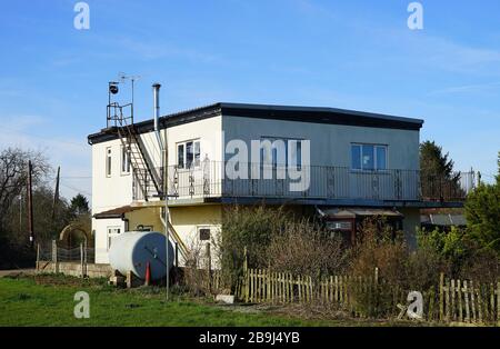 RAF Podington's Second World War control tower converted into a home. Stock Photo