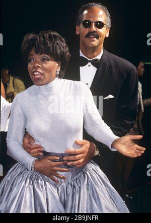 ***FILE PHOTO*** Oprah Winfrey Announces Boyfriend Stedman Graham Is Practicing Social Distancing After Traveling.  Oprah Winfrey with Stedman Graham pictured at Essence Magazine Awards at the Paramount Theater in New York City on May 12th, 1995.  Credit: RTSpellman / MediaPunch Stock Photo