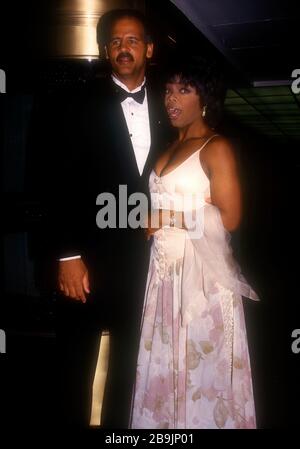 ***FILE PHOTO*** Oprah Winfrey Announces Boyfriend Stedman Graham Is Practicing Social Distancing After Traveling. Credit: Walter McBride/MediaPunch OPRAH WINFREY AND STEDMAN GRAHAM 5/25/94 DAYTIME EMMY AWARDS RADIO CITY MUSIC HALL, NYC. CREDIT ALL USES Stock Photo