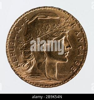 Part 20 francs in gold of the Third Republic, 1907 Jules-Clément Chaplain (1839-1909). Piècede 20 francs en or de la IIIe République, 1907. Or. 1907. Paris, musée Carnavalet. Stock Photo