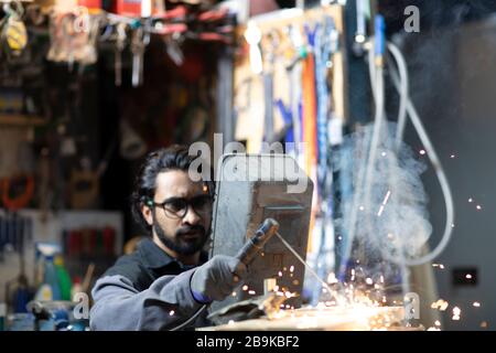 young welder technician working in workshop Stock Photo