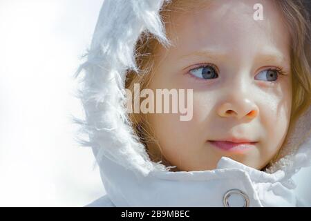 Portrait of a cute girl on a winter day Stock Photo