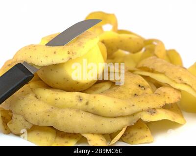 Peeled potatoes and kitchen knife against white background Stock Photo