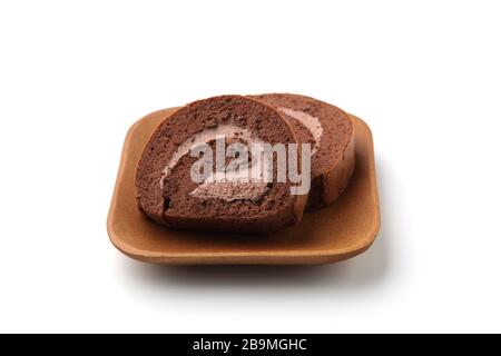 chocolate roll cakes on plate isolated on white background Stock Photo