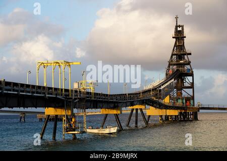 Salt pier conveyor to transport salt to ship loading Bonaire, Caribbean Stock Photo