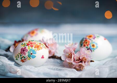 Decoupage decorated Easter eggs with cherry blossom flowers Stock Photo