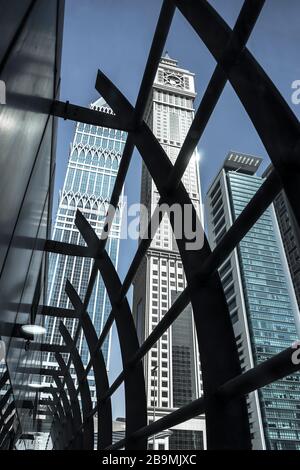 View through the fence of the transition to the large modern city of Dubai, United Arab Emirates, Jun. 2018 Stock Photo