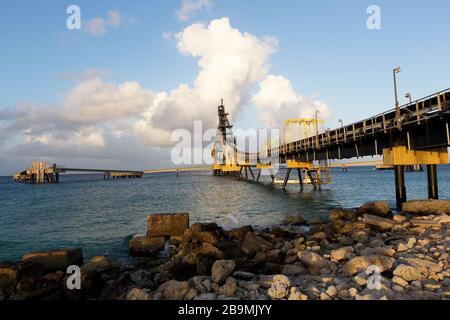 Salt pier conveyor to transport salt to ship loading Bonaire, Caribbean Stock Photo