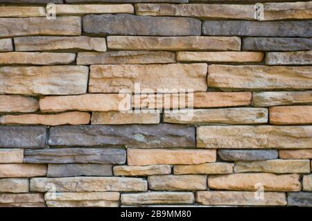 Yellow and Gray Masonry Wall Background Stock Photo