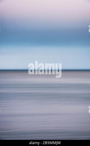 Abstract of sea and sky, blurred using intentional camera movement Stock Photo