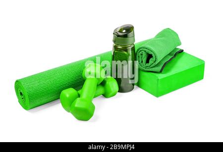 Yoga mat and dumbbells Isolated on white background Stock Photo