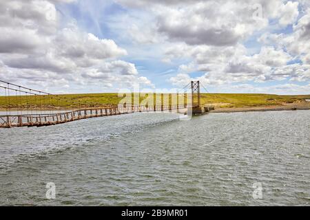 Bodie Creek Suspension Bridge, East Falkland, Falkland Islands, Falklands Stock Photo
