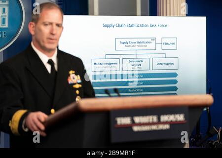 Washington, United States of America. 23 March, 2020. Logistics specialist Rear Admiral John Polowczyk explains a supply chain diagram at the Coronavirus Task Force briefing in the Press Briefing Room of the White House March 23, 2020 in Washington, DC.  Credit: Shealah Craighead/White House Photo/Alamy Live News Stock Photo