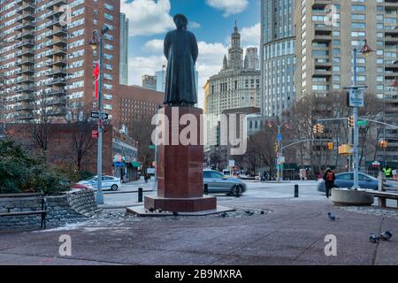 Statue of Lin Ze Xu in Chinatown Manhattan (A Pioneer in the war against drugs ) daylight view with people , cars  and skylines with clouds in the sky Stock Photo