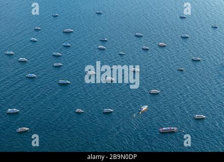 Aerial view of Tourist Boats at anchor in the Titicaca Lake, Copacabana, Bolivia. Stock Photo