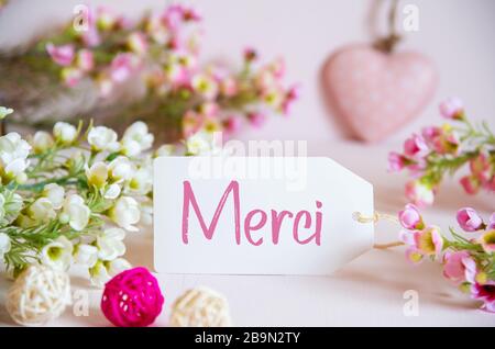 Merci Spring Spring Flower Decoration, Label With Merci Means Thank You Stock Photo ...