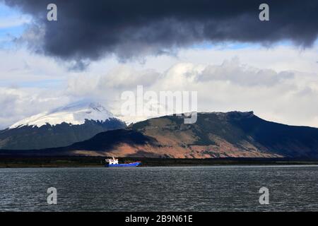 View of Cerro Monumento Moore, Gulf of Admiral Montt, Puerto Natales city, Patagonia, Chile, South America Stock Photo