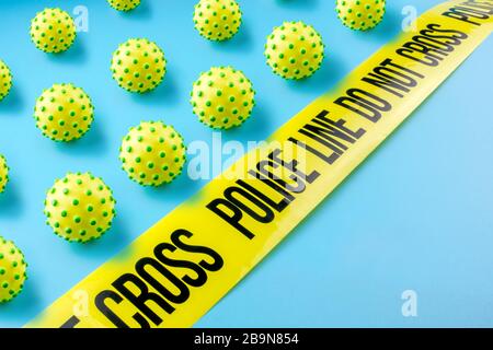 closeup of many little  viruses of corona waiting in front of do not cross line Stock Photo