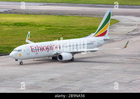 Mahe, Seychelles – February 8, 2020: Ethiopian Boeing 737-800 airplane at Mahe airport (SEZ) in the Seychelles. Boeing is an American aircraft manufac Stock Photo