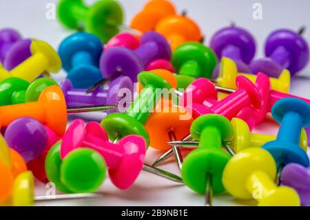 colored stationery buttons on a white background. Close-up photo Stock Photo