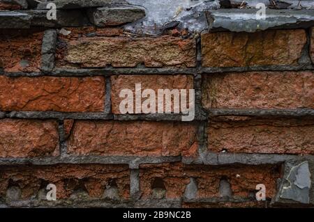 Old Orange and red Damaged Brick Wall Texture Photo Stock Photo