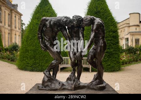 Peaceful park of Museum Rodin. Sculpture of the Three Shades, inspired with Divine Comedy of Dante. Best places to visit in Paris. Stock Photo