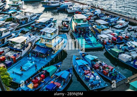 Aerial View of Colorful Old Boats in Male Harbor - Male, Maldives Stock Photo