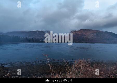 Dramatic rainy clouds over Loch Leven in Scottish Highlands Stock Photo