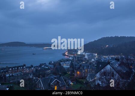 View from McCaig's tower looking over Oban harbour at rainy evening in the Highlands of Scotland Stock Photo
