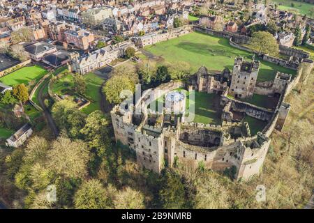 Top down aerial view over ruins of medieval fortification - Ludlow Castle in Shropshire, UK Stock Photo