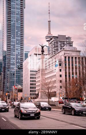 TORONTO, CANADA - 01 04 2020: Traffic on University Avenuebeside the South African War Memorial in Downtown Toronto, Ontario, Canada Stock Photo